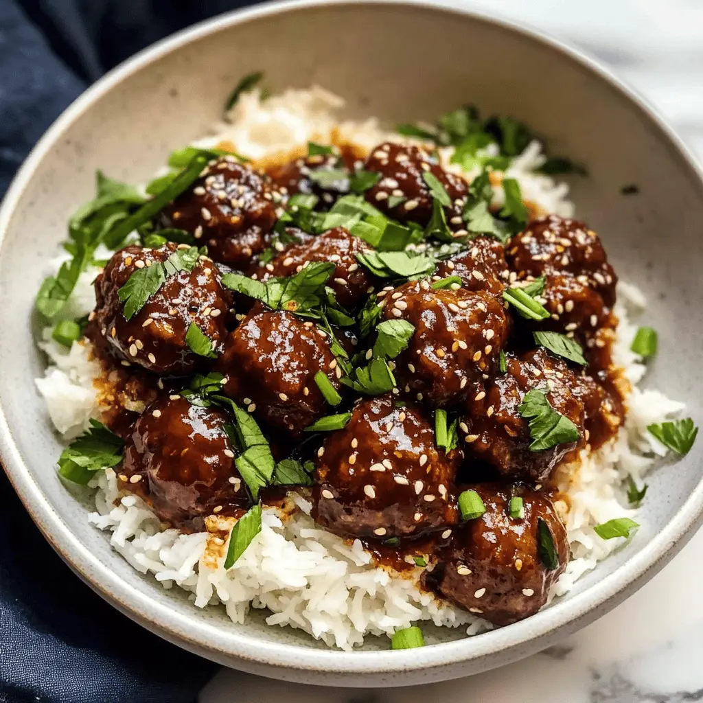 Get ready for a quick and tasty dinner with these 30-minute Mongolian Beef Meatballs! Tender meatballs bursting with flavor, coated in a sweet and tangy sauce, are perfect for busy weeknights. With simple ingredients and easy preparation, you're sure to impress your family or guests. Save this recipe for a delightful meal anytime! Perfect for a cozy night in or a last-minute gathering.