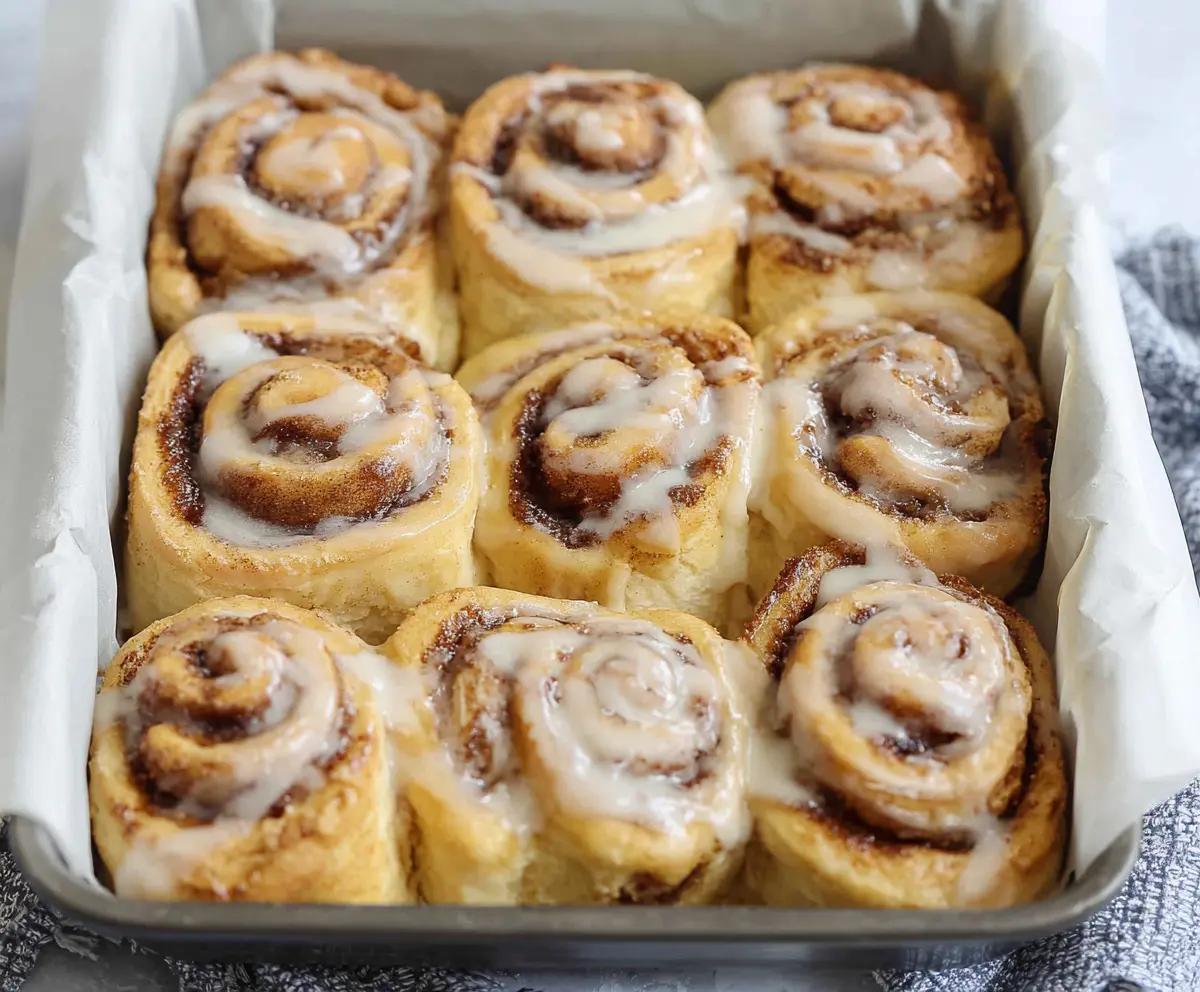 Delicious 30-minute sourdough discard cinnamon rolls fresh out of the oven with swirls of cinnamon and sugar.