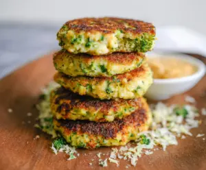 Crispy broccoli cheese patties on a plate, perfect for a healthy snack or appetizer.